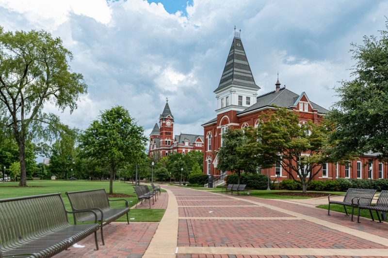 Auburn, Alabama/USA- July 7, 2019: A scenic view looking down the walkway leading to Hargis Hall on the campus of Auburn University in the summer time.