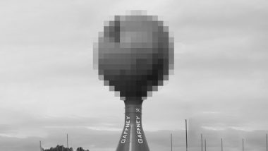 A censored photo of the Peachoid water tower in South Carolina