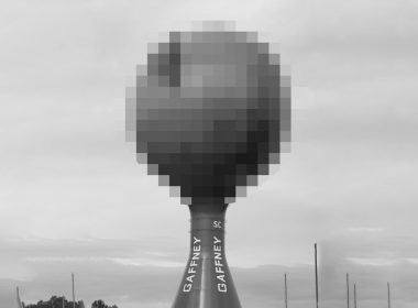 A censored photo of the Peachoid water tower in South Carolina