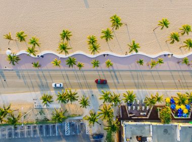 Top down view of a scenic drive along the sandy beach in Florida