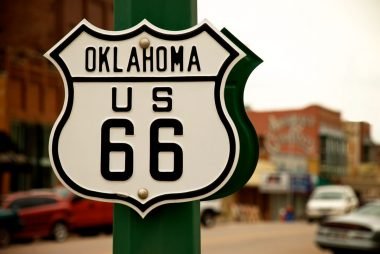 A highway sign for Route 66 through Oklahoma in the town of Chandler, OK.