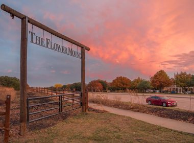 A wooden archway denotes the location of The Flower Mound, where the land is kept undisturbed in Flower Mound, TX.