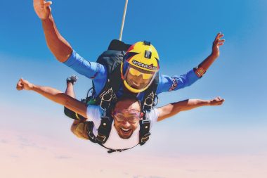 Two men on a skydiving adventure.