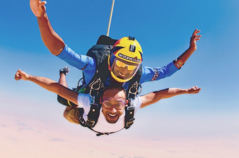 Two men on a skydiving adventure.