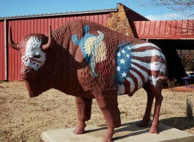 A decorated buffalo (or American bison) sculpture on the grounds of the National Hall of Fame for Famous American Indians in Anadarko, a small city in southwest Oklahoma that includes the headquarters of the Apache Tribe of Oklahoma.