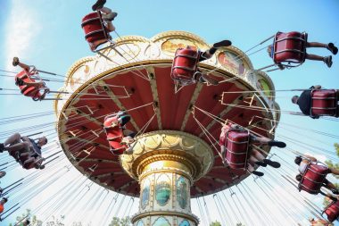 Looking up as people ride the Wave Carousel in Branson, Missouri.