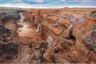 A landscape view of the Grand Falls in Arizona, fondly referred to as Chocolate Falls due to it's brown color