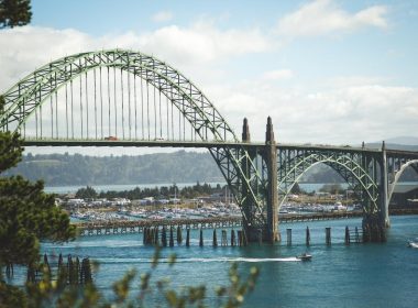 The Interstate Bridge between Washington and Oregon with Hayden Island behind it in the Columbia River.