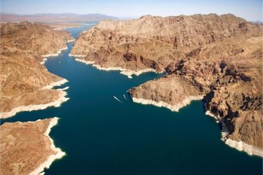 Aerial view of Lake Mead carving into the surrounding desert rocks