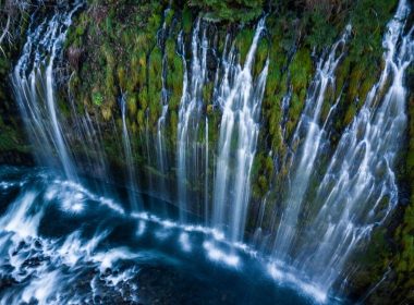 Mossbrae Falls in California is a waterfall over a mossy cliff with several streams.