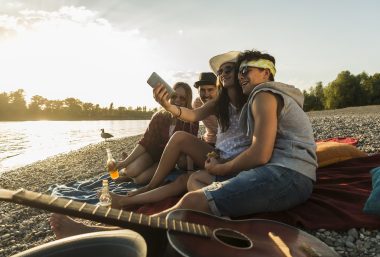 Friends together at sunset in Colt State Park