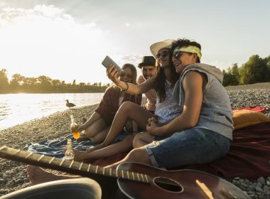 Friends together at sunset in Colt State Park