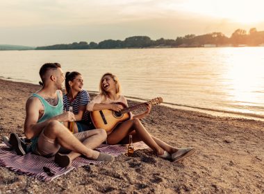 Friends singing on the Singing Beach in Massachusetts.