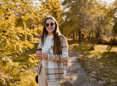 Woman walking through Dublin, New Hampshire in the autumn