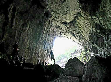 Person exploring the Cave of the Evil Spirit