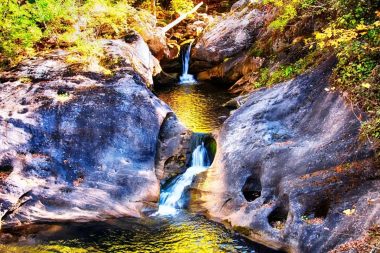 The waterfalls at Kent Falls State Park in Kent, CT during Autumn