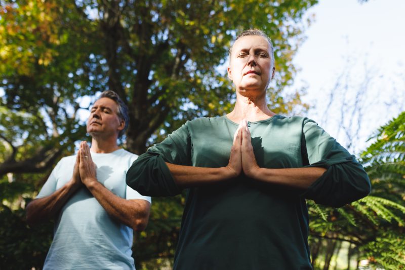 Couple meditating in Blue Cliff Monastery