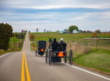 Amish horse and carriage driving into Amish country