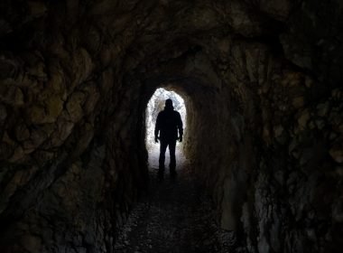 Man walking through tunnel in Steep Rock Preserve, CT
