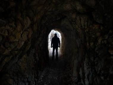 Man walking through tunnel in Steep Rock Preserve, CT