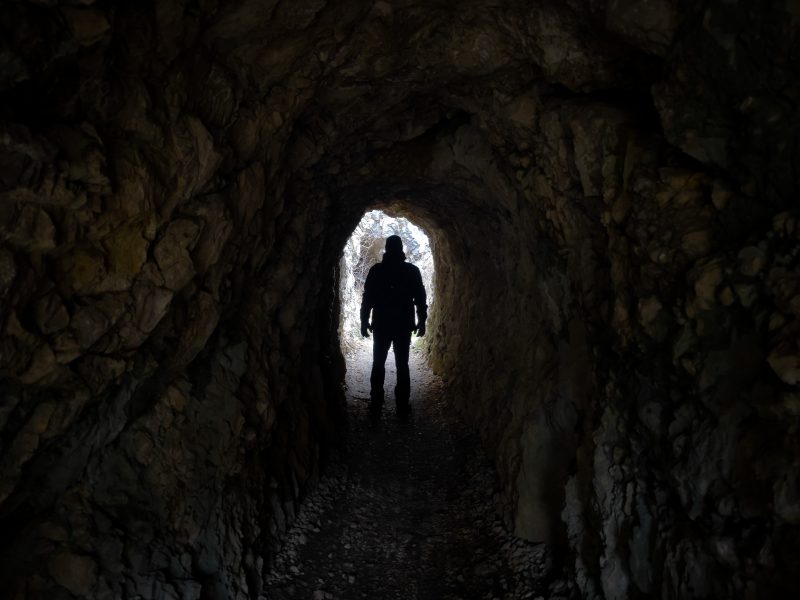 Man walking through tunnel in Steep Rock Preserve, CT