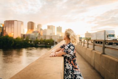 Woman looking at bridge into Hartford, Connecticut