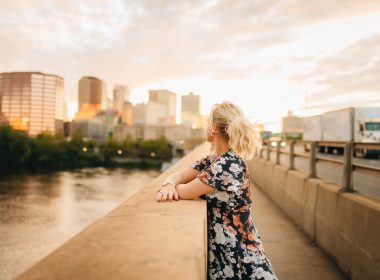 Woman looking at bridge into Hartford, Connecticut