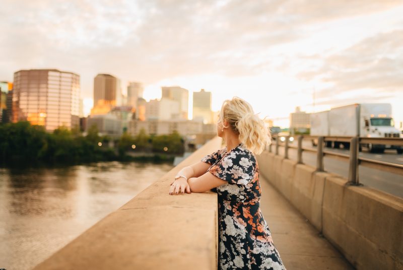 Woman looking at bridge into Hartford, Connecticut