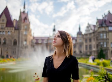 Woman exploring castle in New York