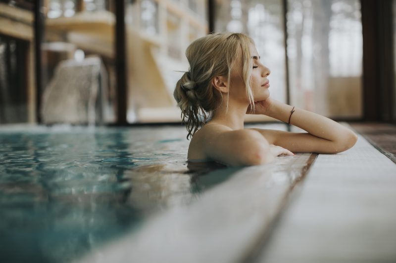 Woman relaxing in Aire Ancient Bath