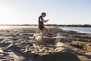Girl playing in sand in Assawoman Wildlife Area