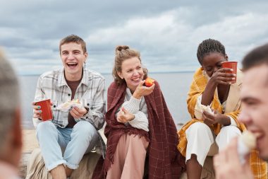 Friends laughing together at Spring Lake Beach