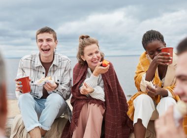 Friends laughing together at Spring Lake Beach