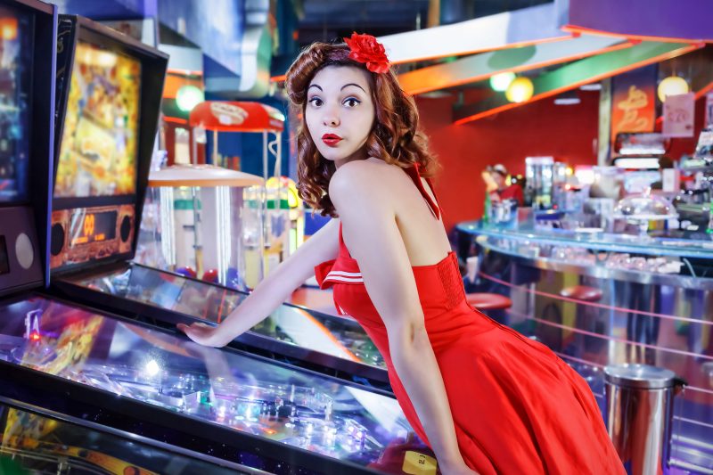 Woman playing pinball in Timeline Arcade in PA