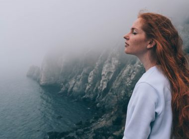 Woman looking out at Neahkahnie Viewpoint