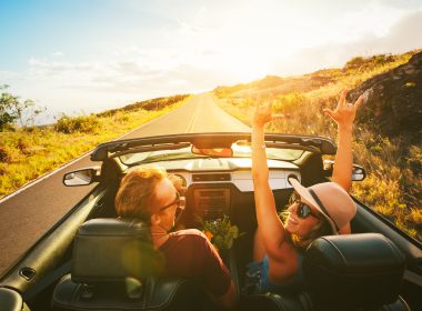 Happy couple on road trip through scenic drive through Central Florida