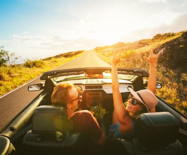 Happy couple on road trip through scenic drive through Central Florida