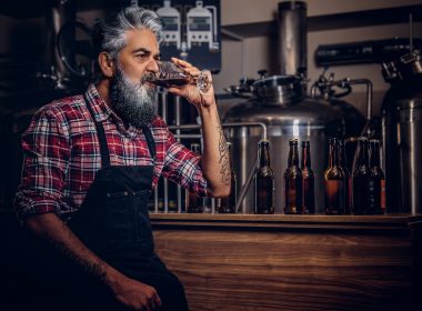 Beer maker drinking beer in St. Louis brewery